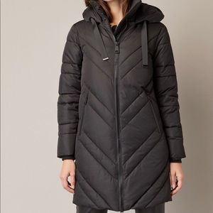 Black quilted winter coat